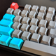 An inexpensive, generic set of side-printed PBT keycaps. (Autobot keycap not included.)